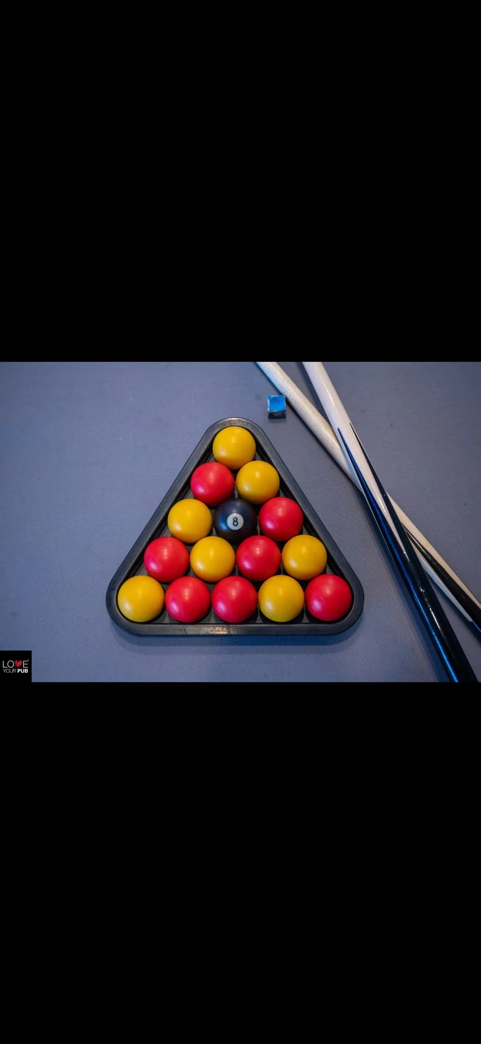 Pool balls set in a triangle